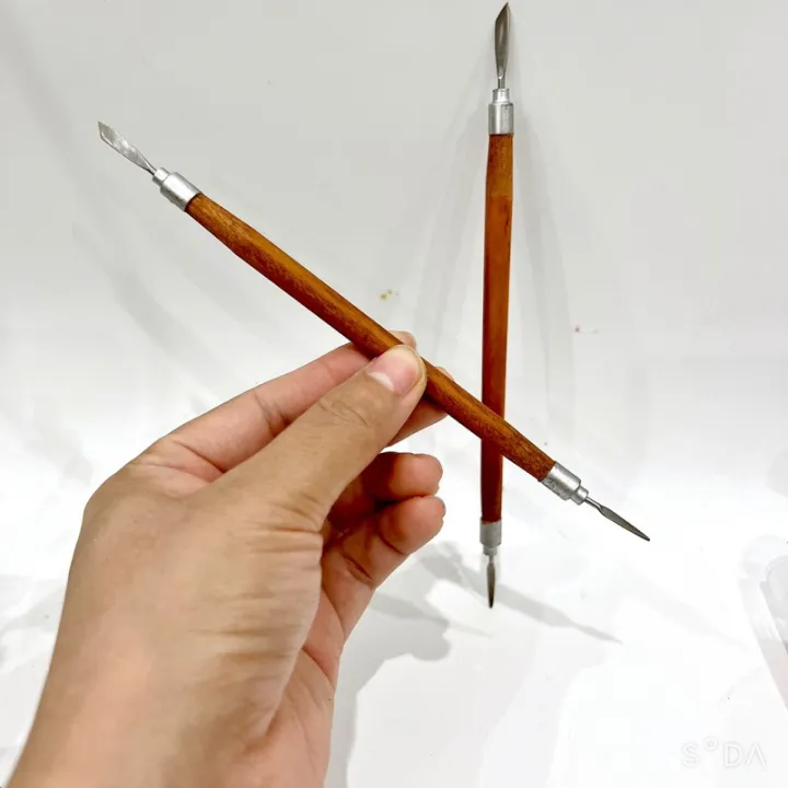 2 of Compact Wooden Handle Ingrown Nail Cleaner with 2 Sharp Blades – Affordable & Professional Nail Care Tool